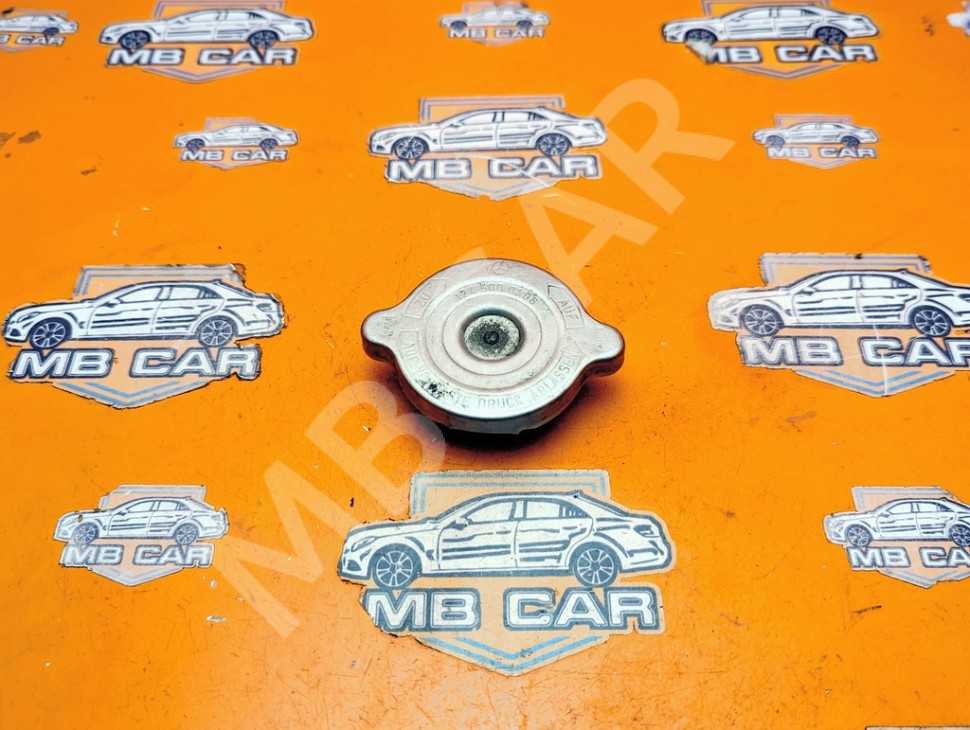 Крышка радиатора MERCEDES-BENZ E-класс W124/S124/C124/A124 (1984 - 1997) фото 1 — Разборка Мерседес